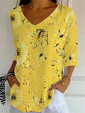 Camisa de flores con escote en pico