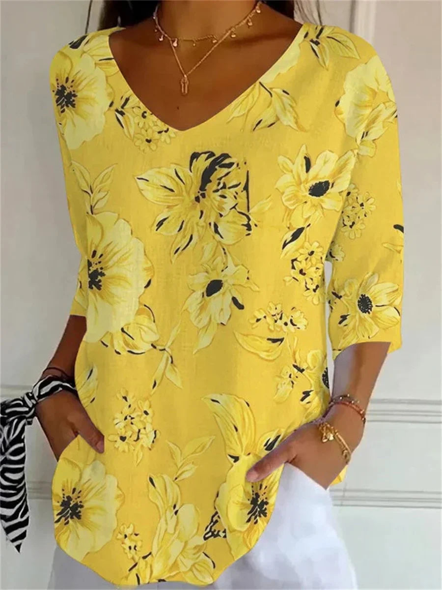 Camisa de flores con escote en pico