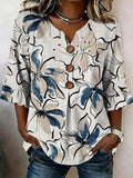 Blusa abstracta con escote en pico