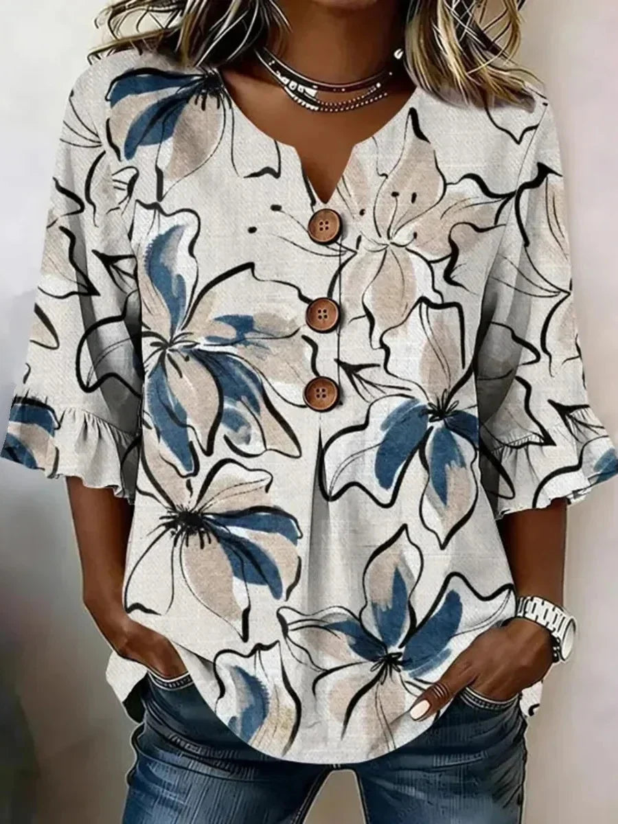 Blusa abstracta con escote en pico