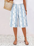 Shorts bermuda de flores azules
