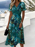 Vestido midi cruzado de flores con escote en pico y manga corta