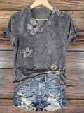 Camisa vintage de flores con escote en pico y manga corta