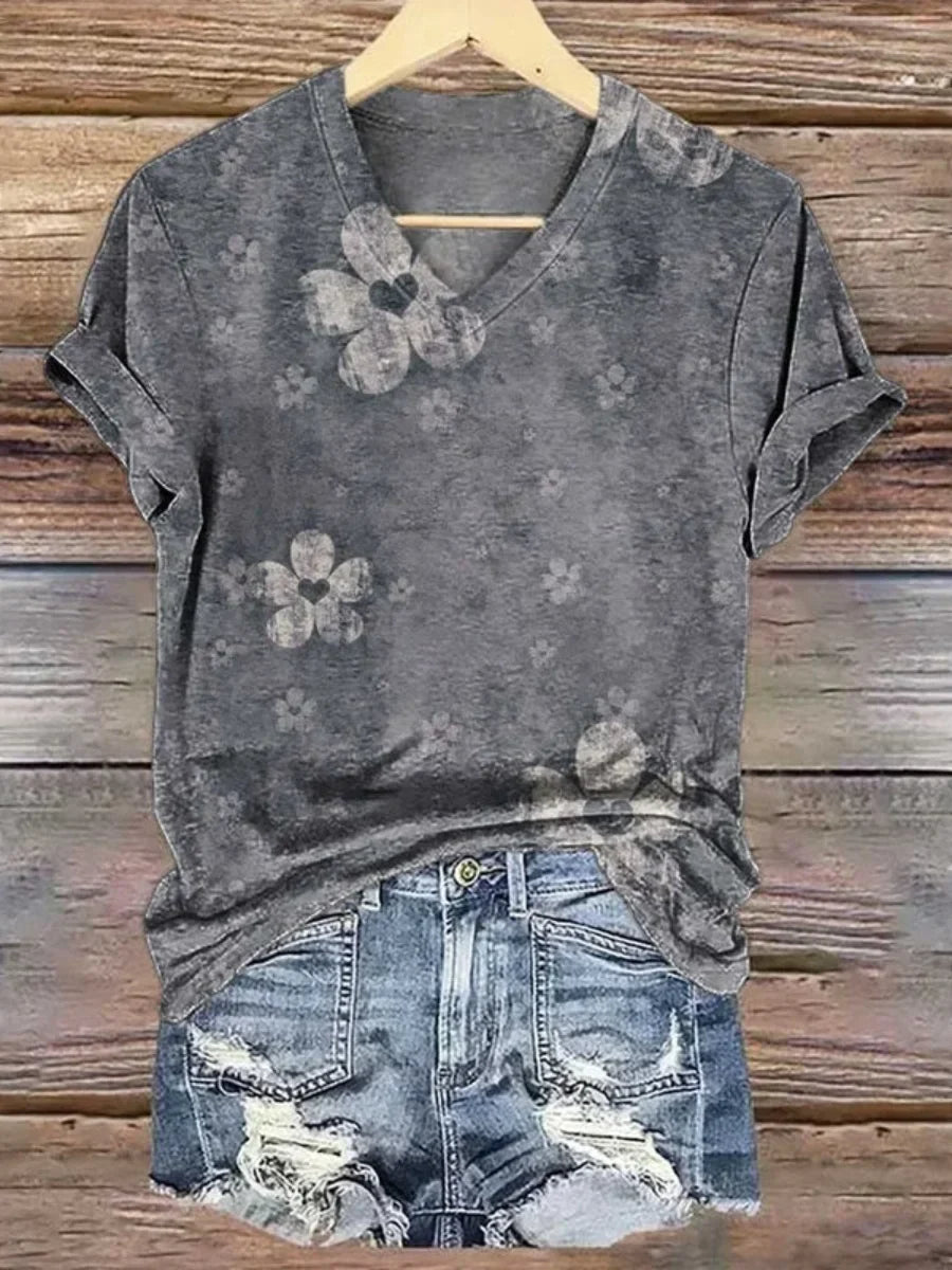 Camisa vintage de flores con escote en pico y manga corta