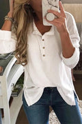 Camisa lisa con cuello redondo, manga larga y botones