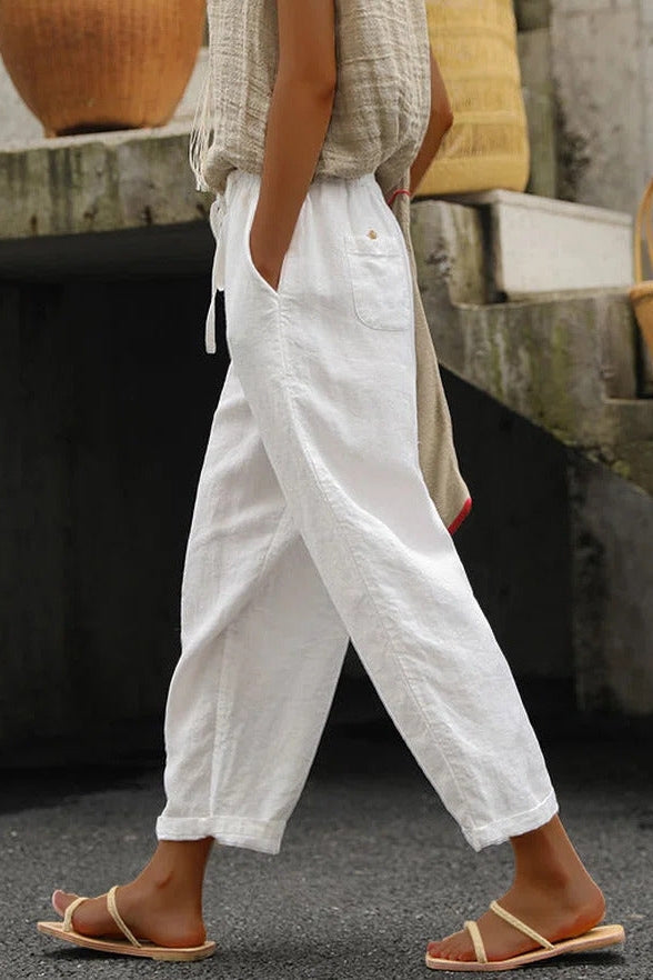 Pantalón holgado liso con bolsillos y cinturón