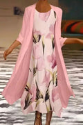 Vestido midi de flores con cuello redondo y manga tres cuartos