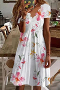 Vestido casual midi de flores con escote en pico y manga corta