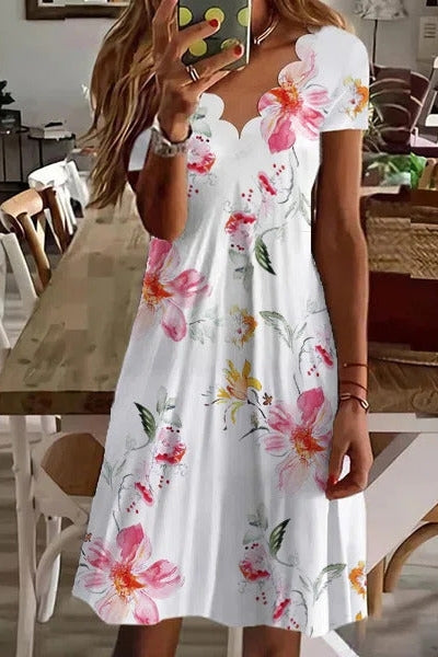 Vestido casual midi de flores con escote en pico y manga corta