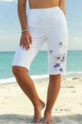 Shorts de mariposas con bolsillos