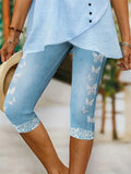 Pantalón capri de talle alto de mariposas