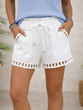 Shorts de talle medio de algodón con cordón ajustable y bolsillos