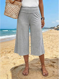 Pantalón moderno cropped de talle medio liso con cintura elástica