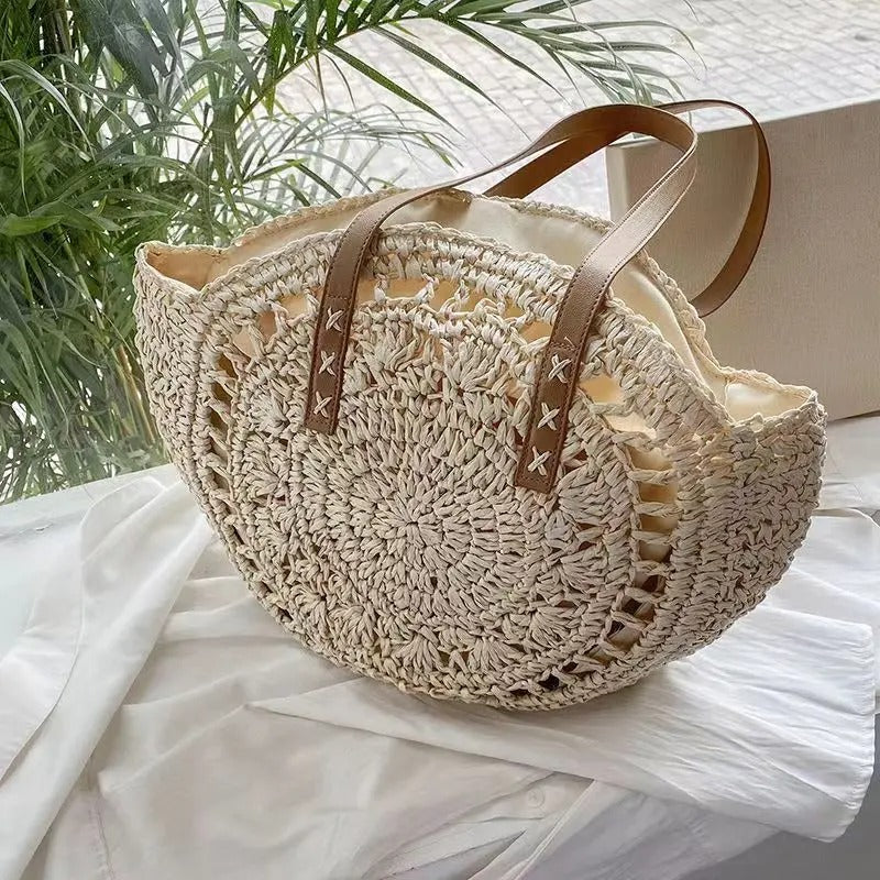Ainhoa Bolso Redondo de Rafia Tejida Estilo Bohemio