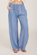 Pantalón de pernera ancha liso con bolsillos