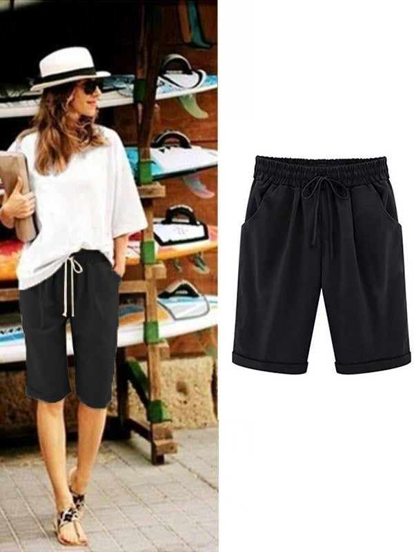 Shorts de fiesta holgados lisos con bolsillos y cinturón