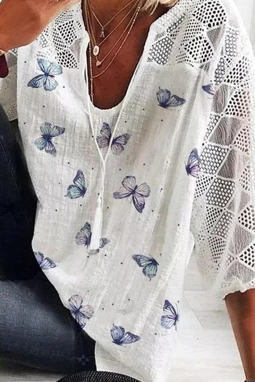 Blusa de mariposas con escote en pico y manga tres cuartos