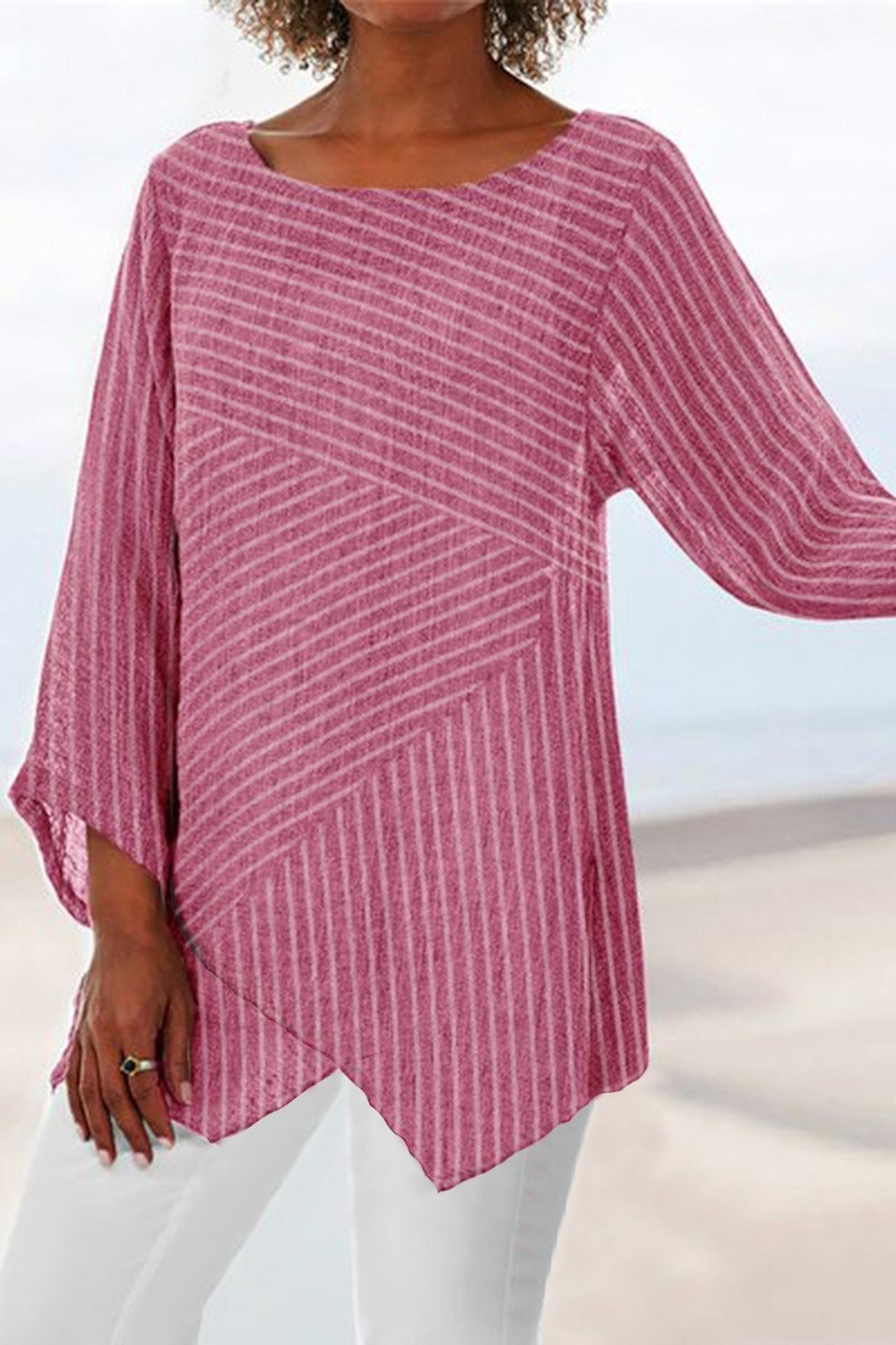 Blusa de rayas con cuello redondo y manga larga