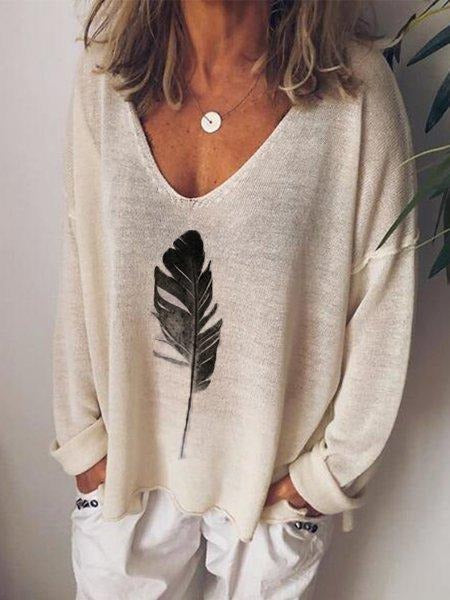 Blusa estampada con escote en pico y manga larga
