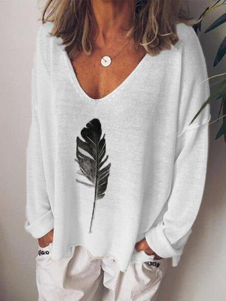 Blusa estampada con escote en pico y manga larga