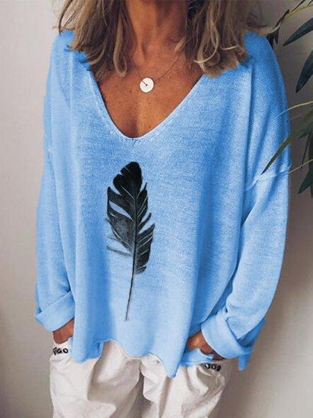 Blusa estampada con escote en pico y manga larga