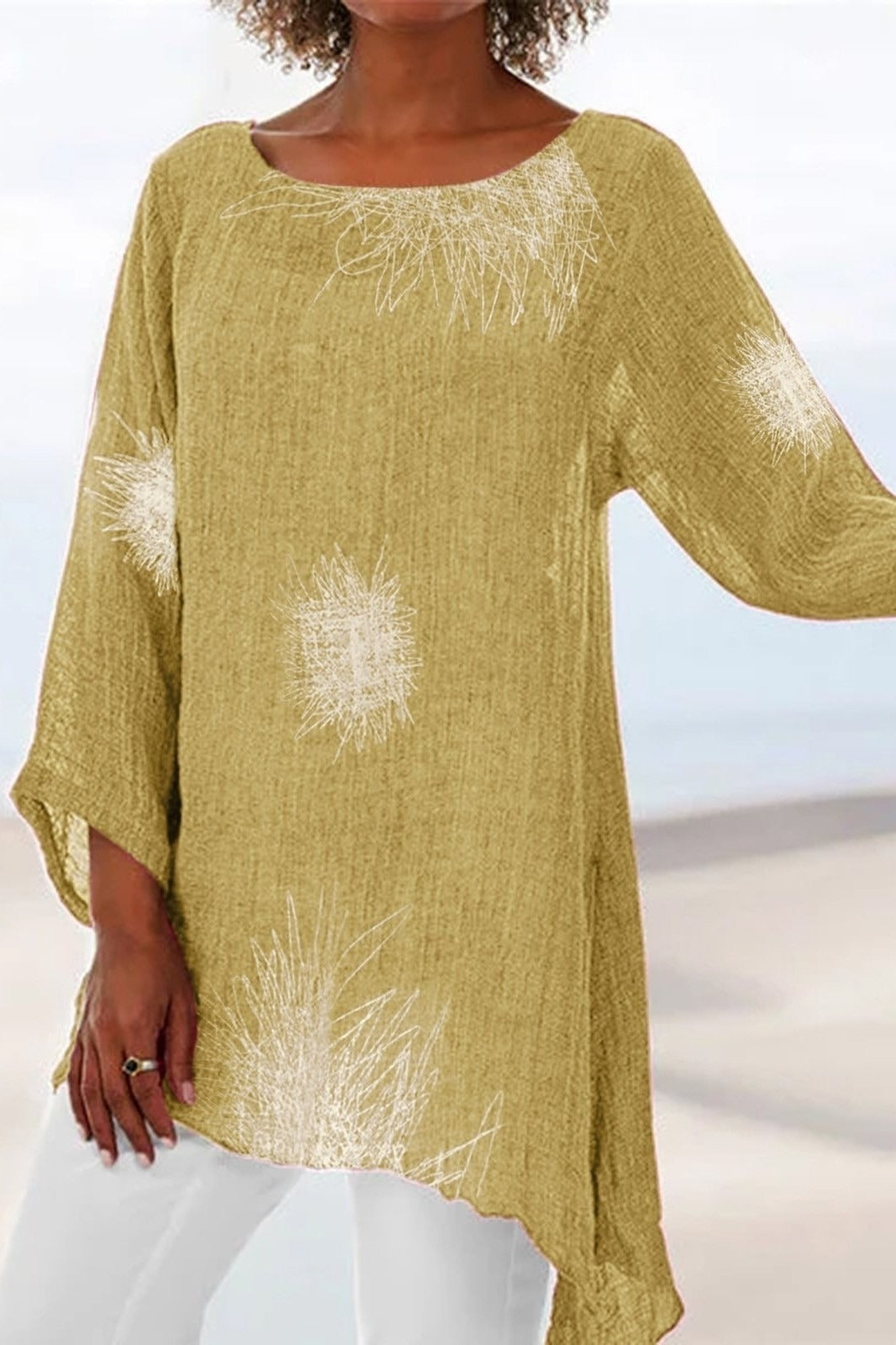 Blusa de flores con cuello redondo y manga larga · Celia