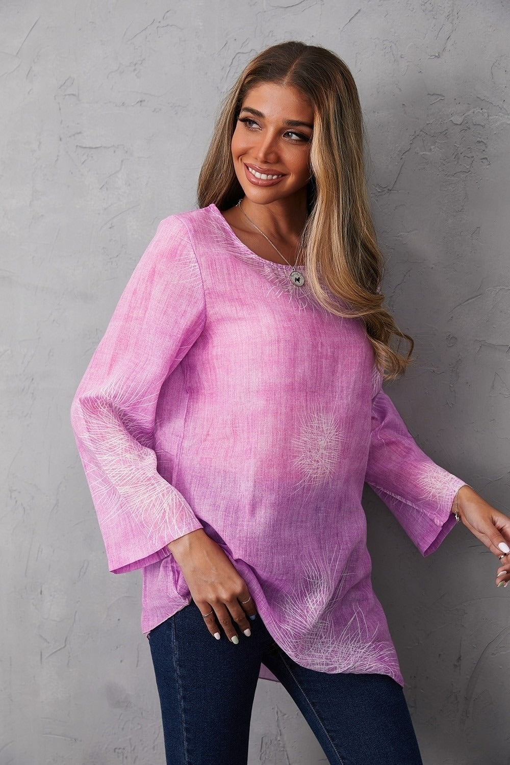 Blusa de flores con cuello redondo y manga larga · Celia