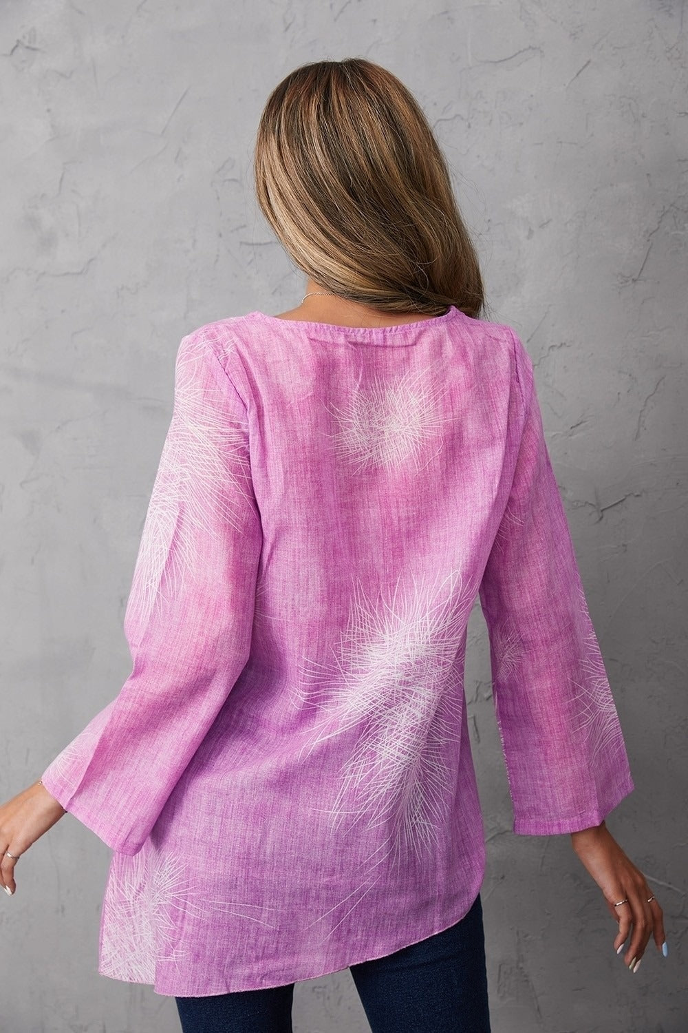 Blusa de flores con cuello redondo y manga larga · Celia
