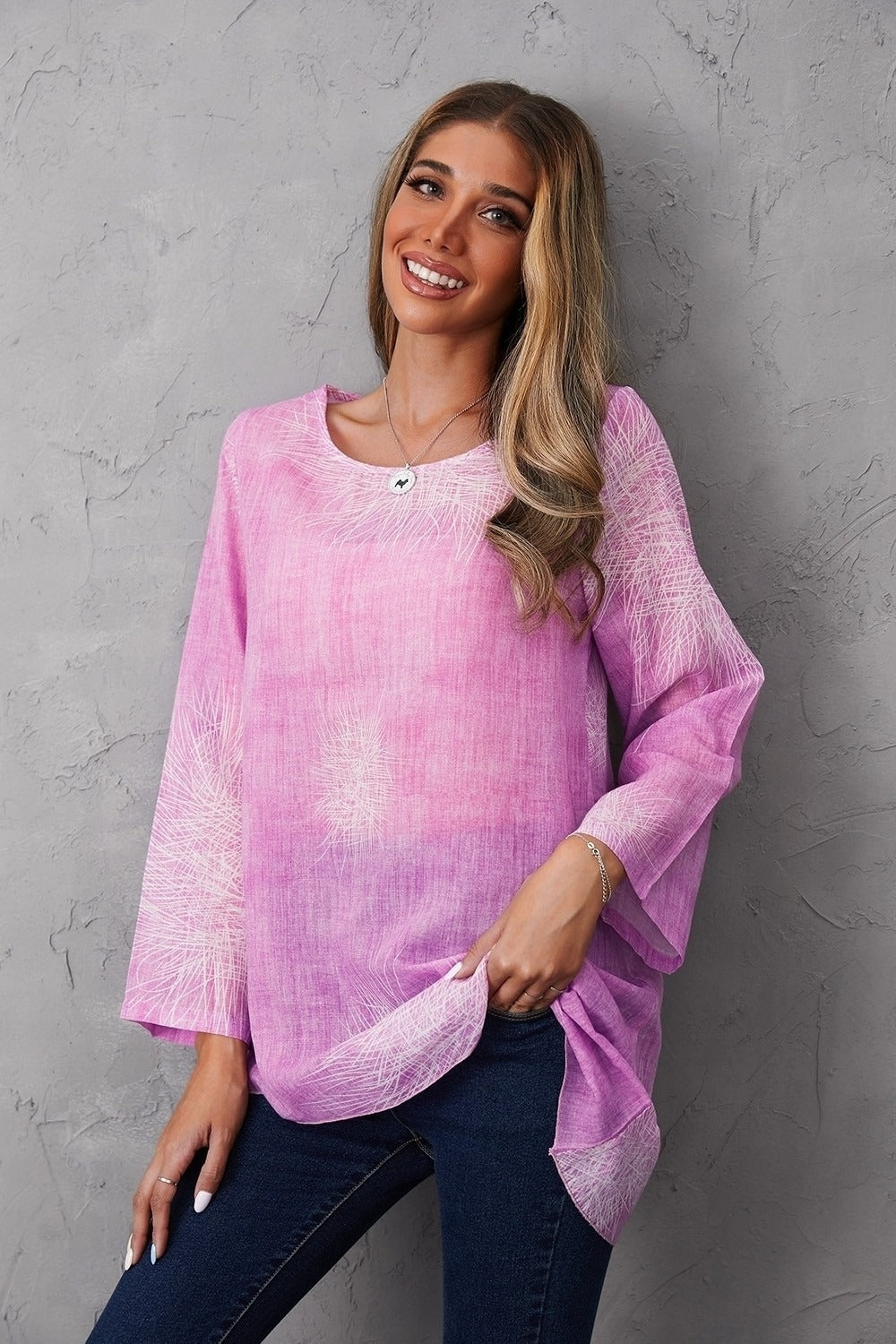 Blusa de flores con cuello redondo y manga larga · Celia