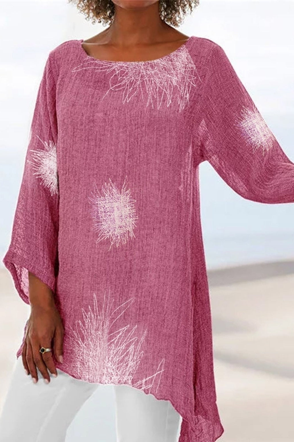 Blusa de flores con cuello redondo y manga larga · Celia