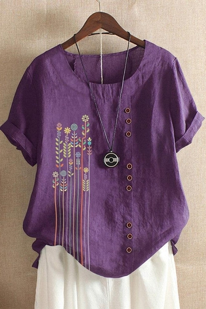 Camisa de flores con cuello redondo y manga corta · Idoia