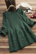 Blusa bordada con cuello redondo y manga larga