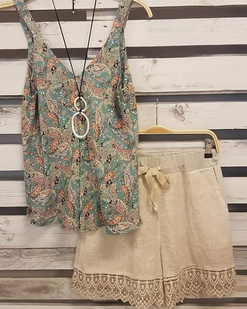 Conjunto de dos piezas de flores con escote en pico, sin mangas